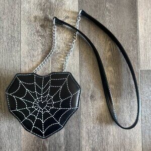 Heart shaped spider web bag.